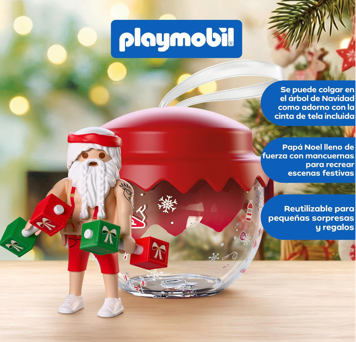 Figura de Papá Noel culturista del Playmobil 72220 con tirantes, tatuaje, pantalón corto rojo y mancuernas de cajas de regalo junto a la bola