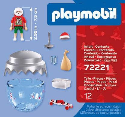 Contenido del Playmobil 72221: Papá Noel skater de 7,5 cm, monopatín, saco de regalos, bola transparente con tapa plateada y cinta para el árbol