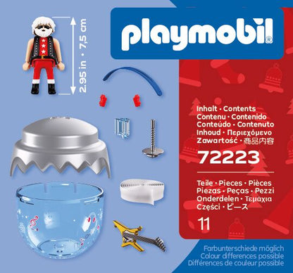 Contenido del Playmobil 72223: Papá Noel rockero de 7,5 cm, guitarra eléctrica, correa, mitones, bola transparente con tapa plateada y cinta