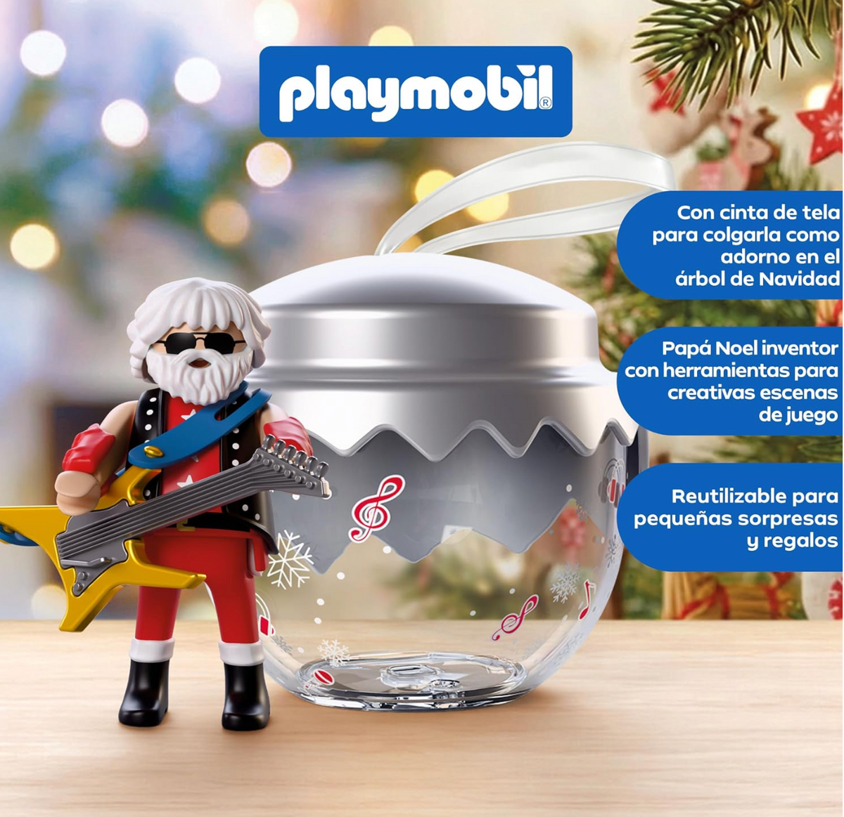 Figura de Papá Noel rockero del Playmobil 72223 con melena, gafas de sol, chaleco con tachuelas y guitarra eléctrica dorada junto a la bola