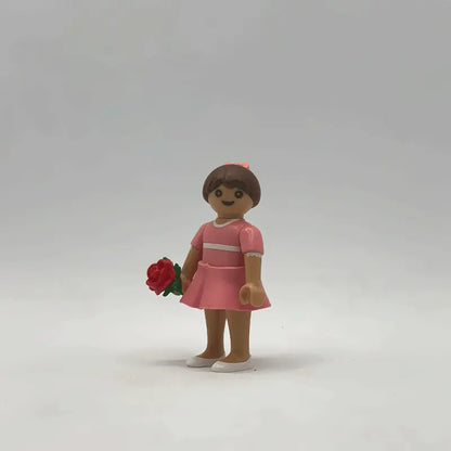 Playmobil Niña Vestido Rosa con Rosa Roja FCO951