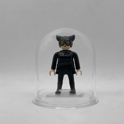 Playmobil Catwoman FCO976 - minifigura DC en urna expositora transparente sobre peana original Playmobil