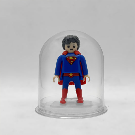 Playmobil Superman FCO979 - minifigura DC en urna expositora transparente sobre peana original Playmobil