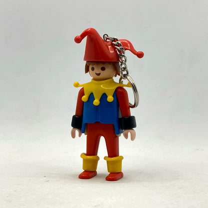 Llavero Playmobil vintage Bufón Arlequín 7605 con gorro rojo de cascabeles, gorguera amarilla y peto azul