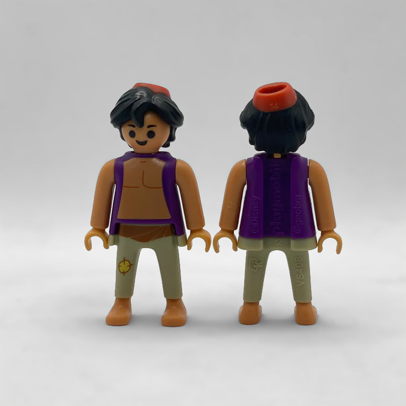 Playmobil Aladín Kinder FCO986 de frente y de espalda, con el marcaje moldeado ©Disney · playmobil · ©geobra y el código de molde VS406