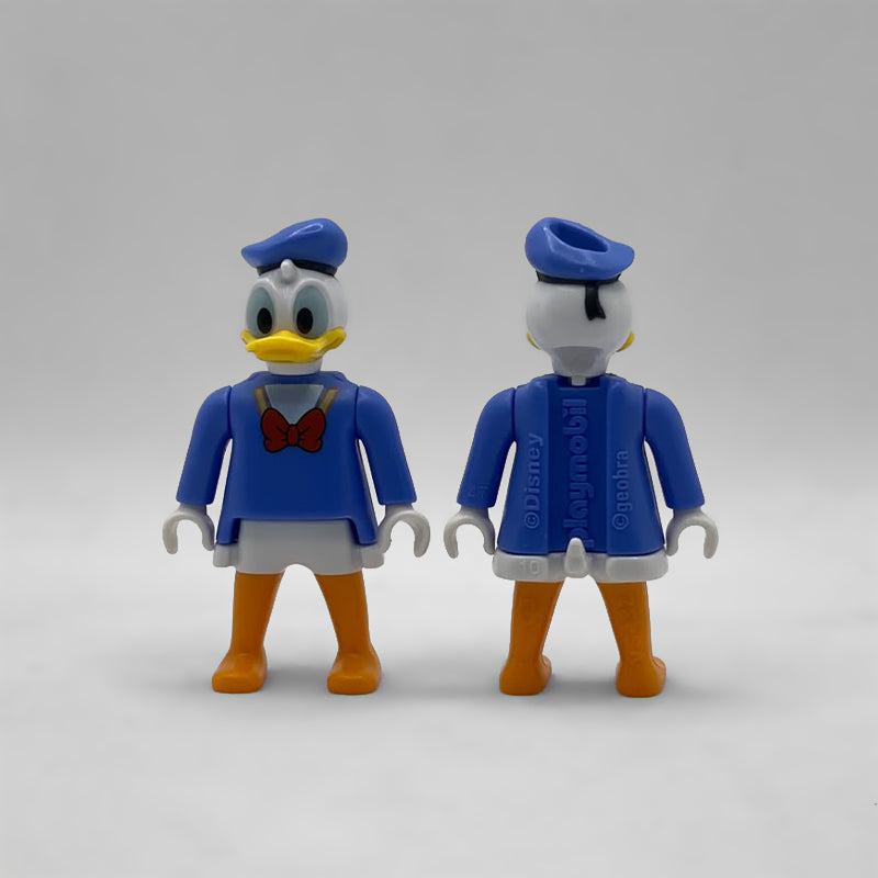 Pato Donald Playmobil FCO1000 de frente y de espalda con el marcaje ©Disney, playmobil y ©geobra moldeado en la casaca